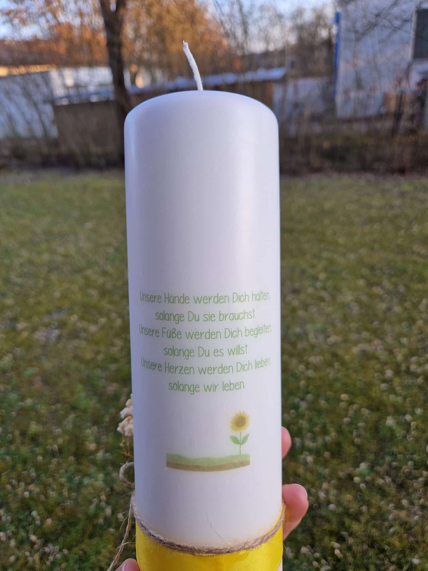 Taufkerze Sonne mit Trockenblumen